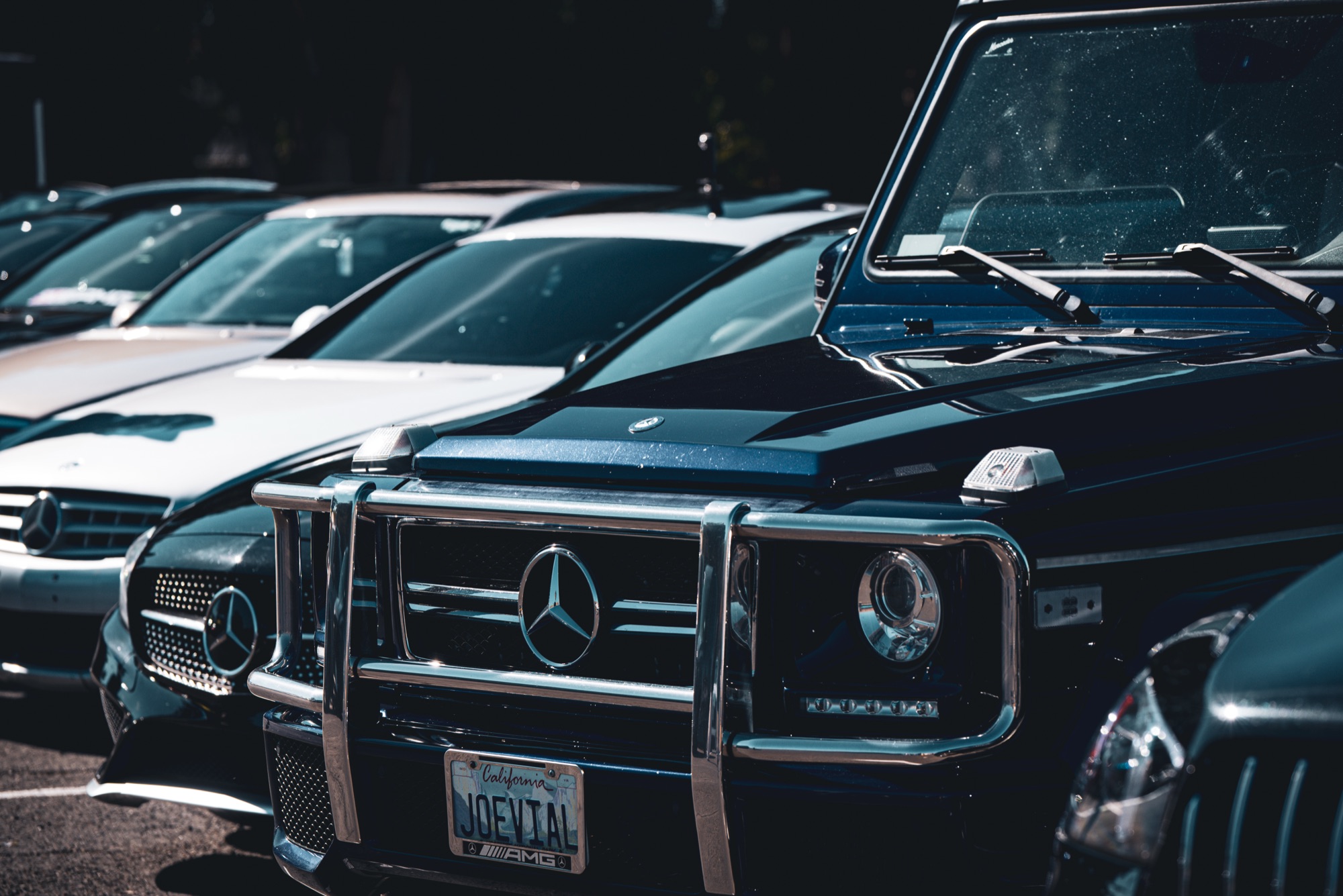 Crowd and cars at the MSJ Car Meet event