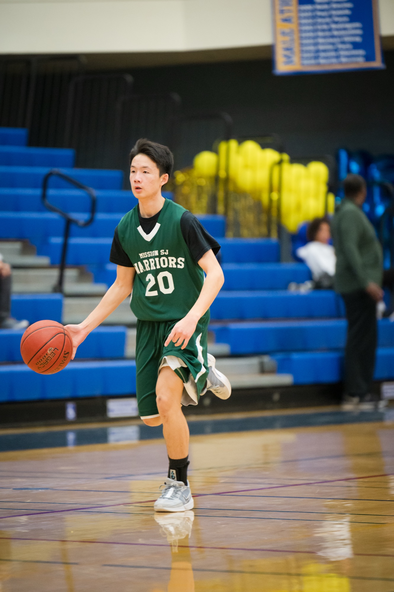 Jadon pushing the break for MSJ Freshman basketball, #20