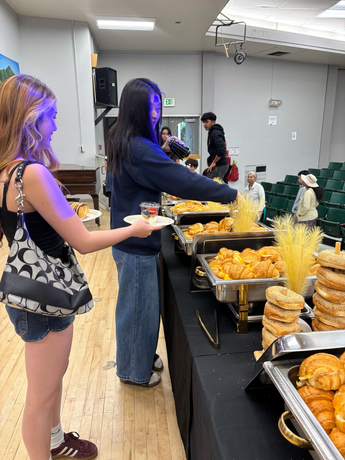 Seniors serving themselves at the catered Senior Breakfast buffet