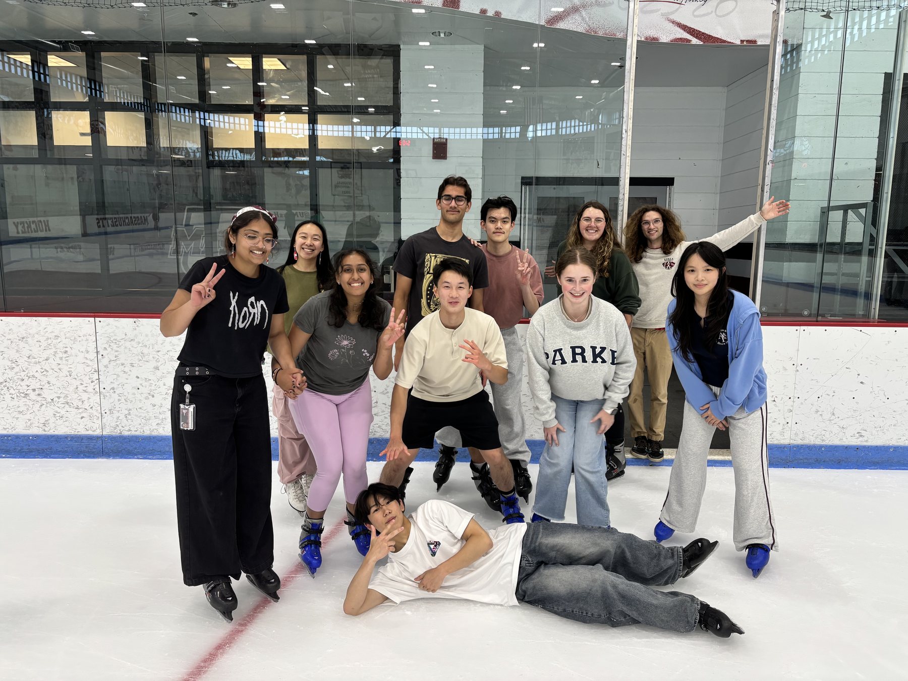 Lab team bonding at the ice rink — his idea, his planning