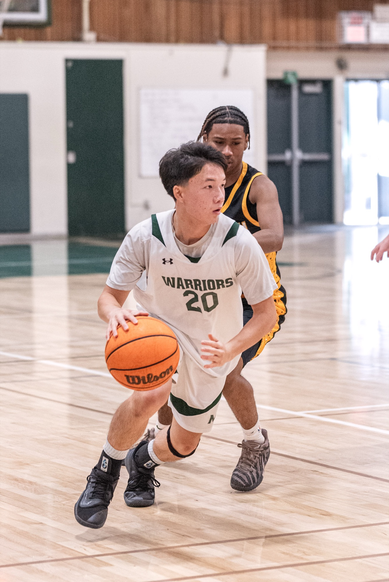 Jadon attacking off the dribble for MSJ Varsity, #20